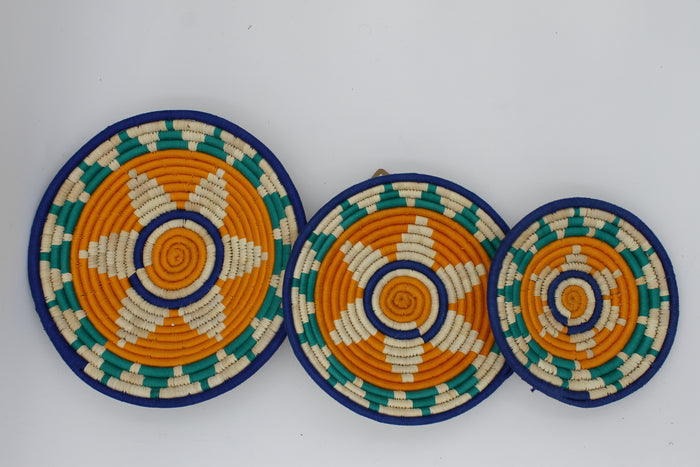 Multicoloured sunburst handwoven set of 3 wall art (Green, yellow and blue)